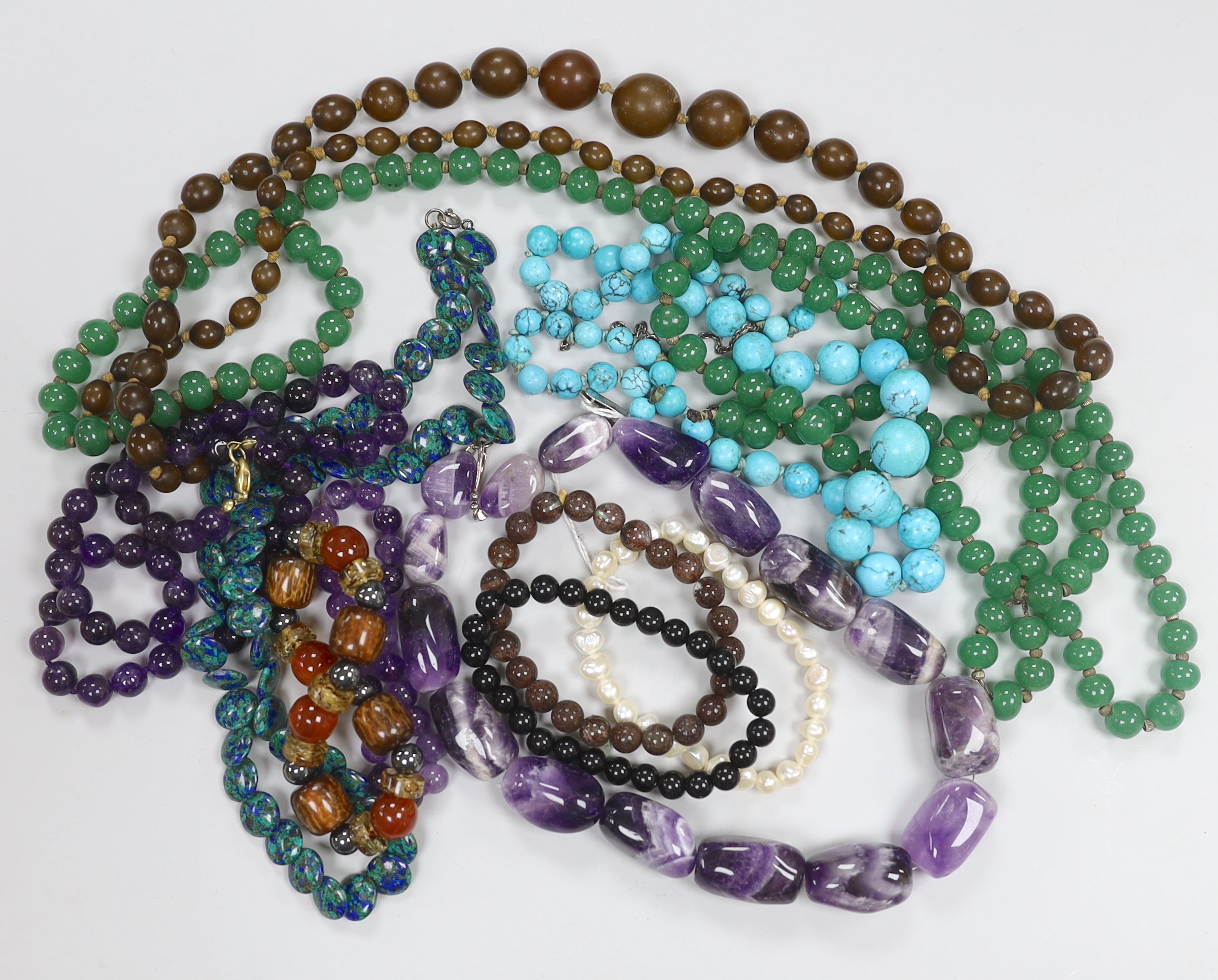 A group of assorted bead necklaces